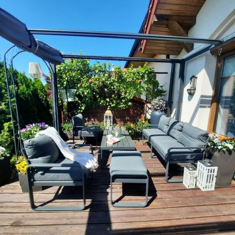 Grafitowy zestaw mebli na taras - sofa 175cm, 2 fotele i 2 pufy - Panaon Dining DG