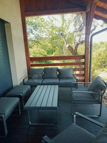 Grafitowy zestaw mebli na taras - sofa 175cm, 2 fotele i 2 pufy - Panaon Dining DG