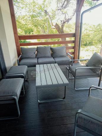 Grafitowy zestaw mebli na taras - sofa 175cm, 2 fotele i 2 pufy - Panaon Dining DG