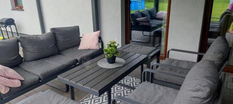 Grafitowy zestaw mebli na taras - sofa 175cm, 2 fotele i 2 pufy - Panaon Dining DG