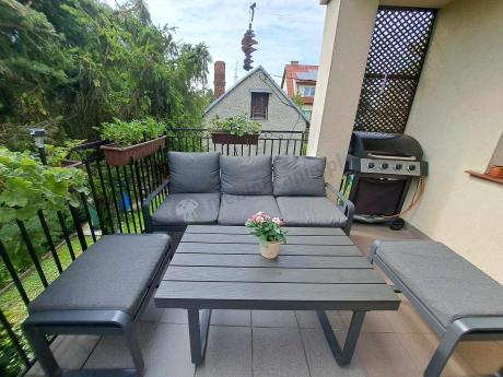 Grafitowy zestaw mebli na taras - sofa 175cm, 2 fotele i 2 pufy - Panaon Dining DG