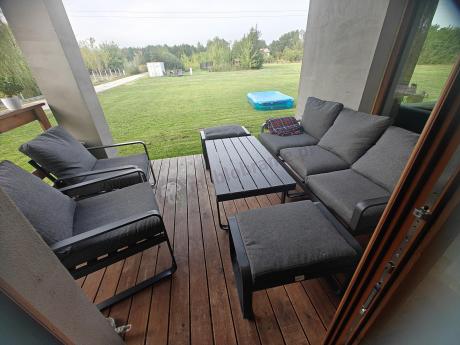 Grafitowy zestaw mebli na taras - sofa 175cm, 2 fotele i 2 pufy - Panaon Dining DG