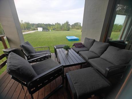 Grafitowy zestaw mebli na taras - sofa 175cm, 2 fotele i 2 pufy - Panaon Dining DG