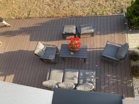 Grafitowy zestaw mebli na taras - sofa 175cm, 2 fotele i 2 pufy - Panaon Dining DG