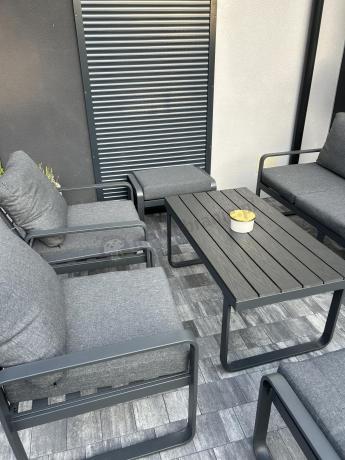 Grafitowy zestaw mebli na taras - sofa 175cm, 2 fotele i 2 pufy - Panaon Dining DG