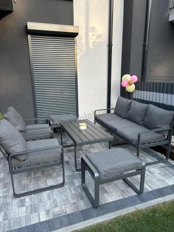 Grafitowy zestaw mebli na taras - sofa 175cm, 2 fotele i 2 pufy - Panaon Dining DG