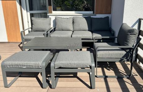 Grafitowy zestaw mebli na taras - sofa 175cm, 2 fotele i 2 pufy - Panaon Dining DG