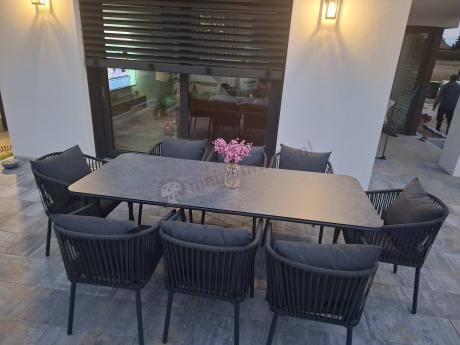 Grafitowy zestaw mebli obiadowych na taras dla 8 osób - Kostto Dining 8+1