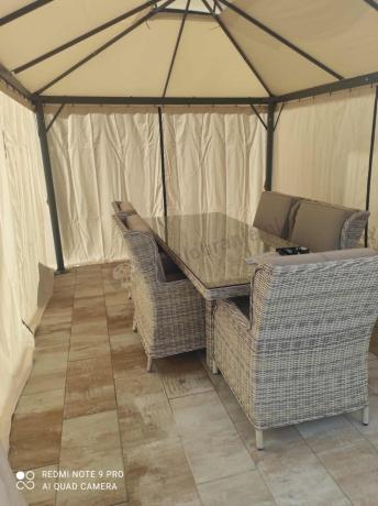 Jasne technorattanowe meble obiadowe na taras - stół 220cm + 8 foteli Laritto - Beige