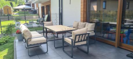 Jasny komplet mebli metalowych na taras dla 8 osób - Panaon Grande WB