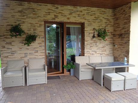 Komplet mebli z sofą i wysokim stołm technorattan Cofete Dining – Natural