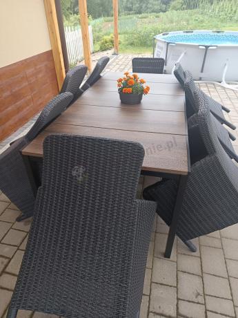 Meble obiadowe na taras Portis Comfort ze stołem 200cm w kolorze orzecha i 8 fotelami