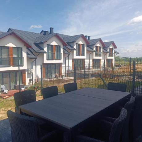 Meble obiadowe na taras Portis Comfort ze stołem 200cm w kolorze orzecha i 8 fotelami