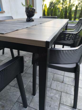 Meble obiadowe na taras Portis Slim ze stołem 160cm w kolorze orzecha i 6 fotelami