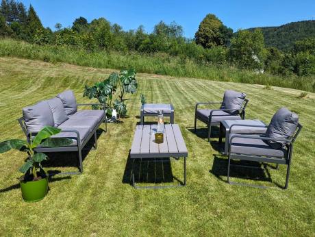 Meble ogrodowe metalowe - sofa 175cm, fotele, pufy i stolik kawowy - Panaon Dining