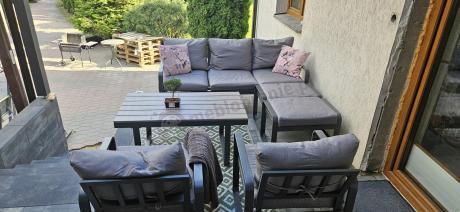 Meble ogrodowe metalowe - sofa 175cm, fotele, pufy i stolik kawowy - Panaon Dining