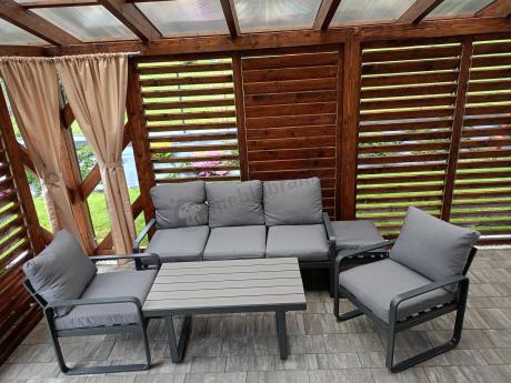 Meble ogrodowe metalowe - sofa 175cm, fotele, pufy i stolik kawowy - Panaon Dining