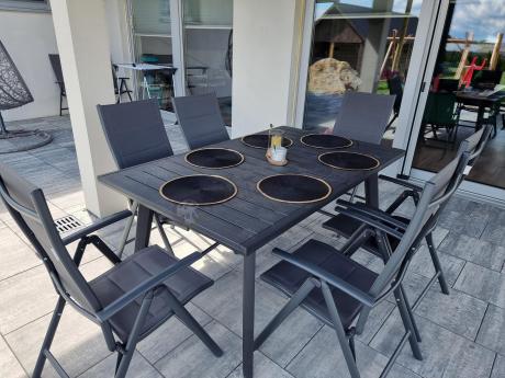 Meble ogrodowe obiadowe dla 8 osób Kantara ze stołem 160-240 cm i składanymi krzesłami