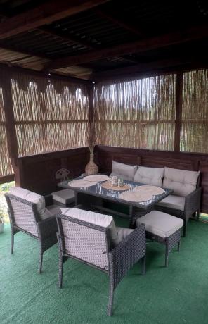 Meble ogrodowe z sofą 175cm, wysokim stołem, fotelami i pufami Perata Dining Brown
