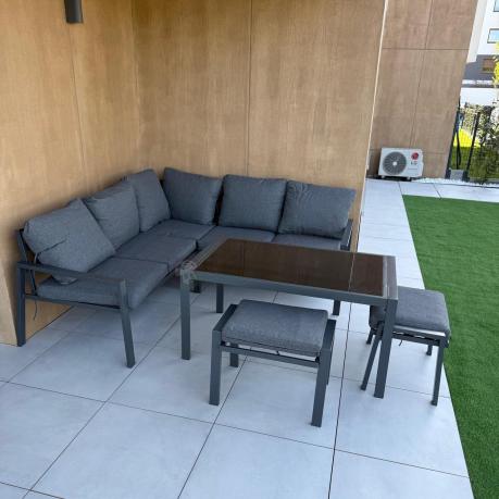 Metalowy narożnik na taras z pufami o stołem 120cm Sodor Corner - Dark Grey