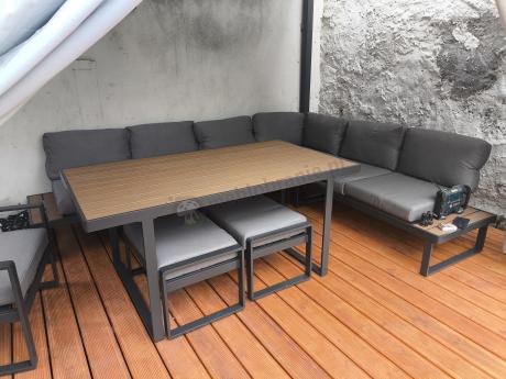 Metalowy narożnik ogrodowy 280x220cm ze stołem obiadowym i fotelem Panaon Grey Teak