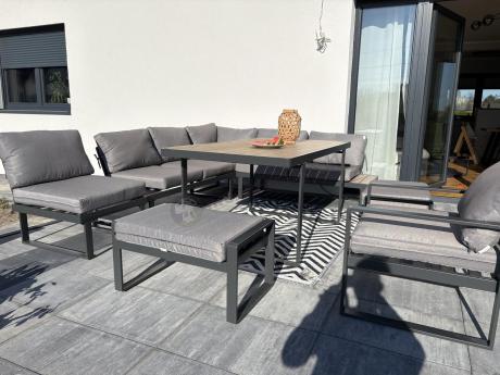 Metalowy narożnik ogrodowy 280x220cm ze stołem obiadowym i fotelem Panaon Grey Teak