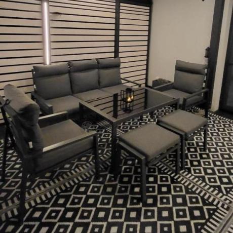 Metalowy zestaw mebli ogrodowych z wysokim oparciem na taras Doros Dining + pufy - Dark Grey