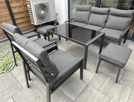 Metalowy zestaw mebli ogrodowych z wysokim oparciem na taras Doros Dining + pufy - Dark Grey