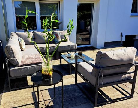 Narożne meble ogrodowe modułowe ze stolikiem i fotelem Trapeno 5 modułów