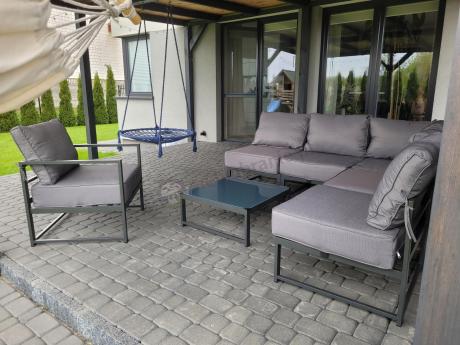 Narożne meble ogrodowe modułowe ze stolikiem i fotelem Trapeno 5 modułów