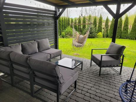 Narożne meble ogrodowe modułowe ze stolikiem i fotelem Trapeno 5 modułów