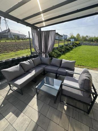Narożne meble ogrodowe modułowe ze stolikiem i fotelem Trapeno 5 modułów