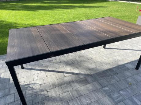 Nowoczesne meble obiadowe dla 10 osób do ogrodu Portis ze stołem 200cm i blatem w kolorze drewna