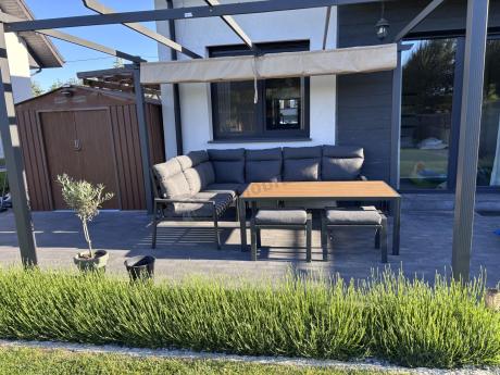 Nowoczesne meble ogrodowe metalowe narożne z pufami i stołem polywood- Doros Corner XL - Dark Grey