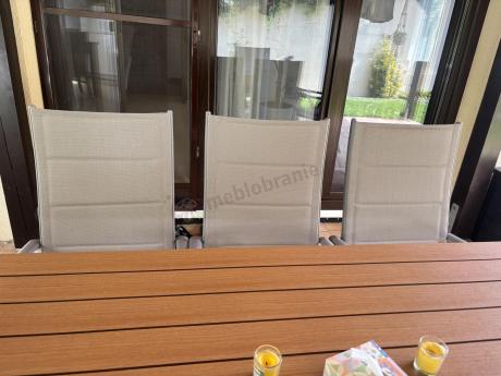 Szare meble ogrodowe - komplet stół i 8 regulowanych krzeseł - Kanbery Wood Silver 8+1