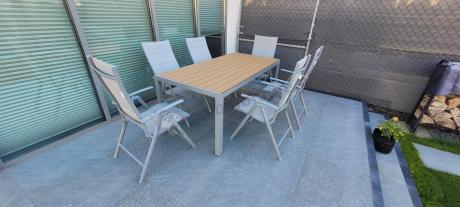 Szare meble ogrodowe - komplet stół i 8 regulowanych krzeseł - Kanbery Wood Silver 8+1