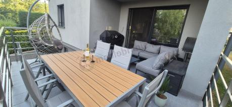 Szare meble ogrodowe - komplet stół i 8 regulowanych krzeseł - Kanbery Wood Silver 8+1