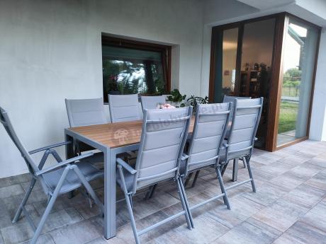 Szare meble ogrodowe - komplet stół i 8 regulowanych krzeseł - Kanbery Wood Silver 8+1