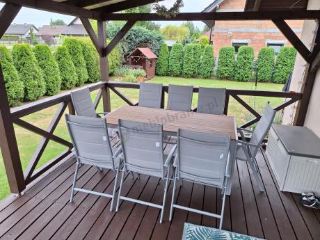 Szare meble ogrodowe - komplet stół i 8 regulowanych krzeseł - Kanbery Wood Silver 8+1