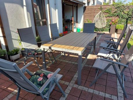 Szare meble ogrodowe - komplet stół i 8 regulowanych krzeseł - Kanbery Wood Silver 8+1