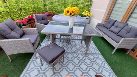 Szare meble ogrodowe technorattan ze stołem obiadowym i sofą Torino Dining