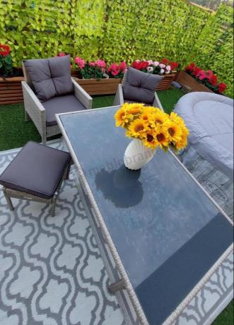 Szare meble ogrodowe technorattan ze stołem obiadowym i sofą Torino Dining