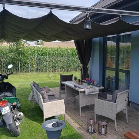 Szare meble ogrodowe technorattan ze stołem obiadowym i sofą Torino Dining