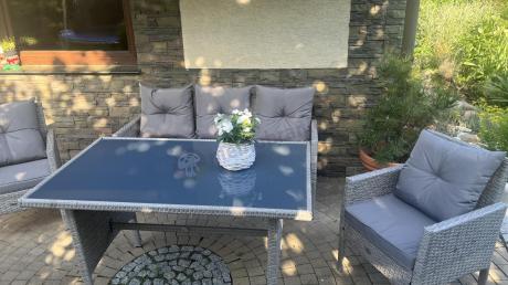 Szare meble ogrodowe technorattan ze stołem obiadowym i sofą Torino Dining