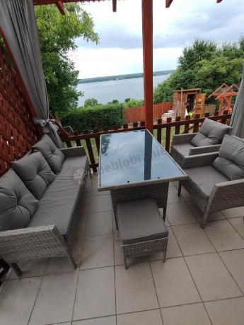 Szare meble ogrodowe technorattan ze stołem obiadowym i sofą Torino Dining