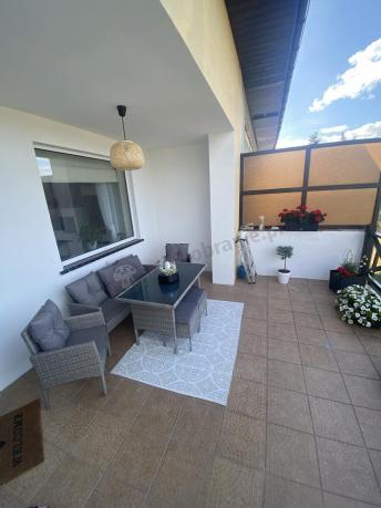 Szare meble ogrodowe technorattan ze stołem obiadowym i sofą Torino Dining