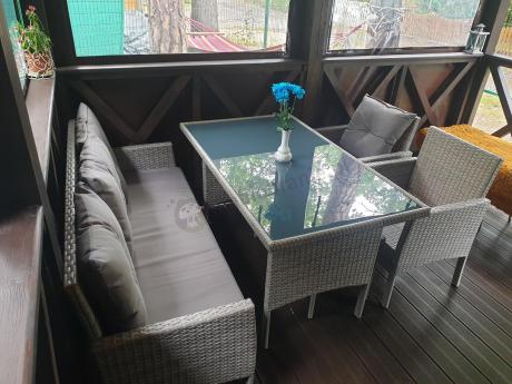 Szare meble ogrodowe technorattan ze stołem obiadowym i sofą Torino Dining