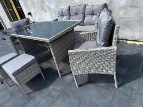 Szare meble ogrodowe technorattan ze stołem obiadowym i sofą Torino Dining