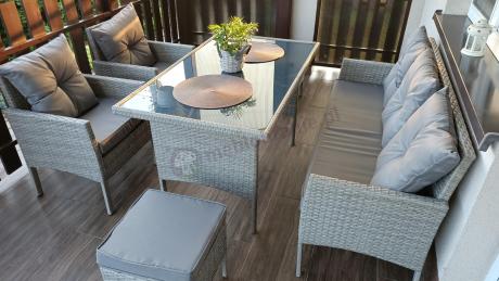 Szare meble ogrodowe technorattan ze stołem obiadowym i sofą Torino Dining