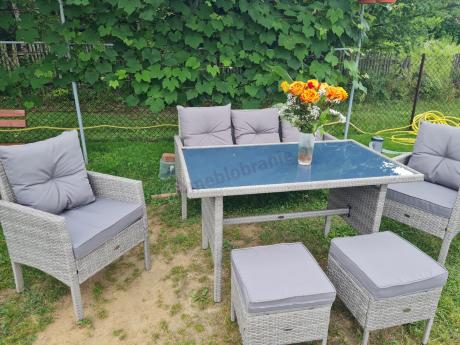 Szare meble ogrodowe technorattan ze stołem obiadowym i sofą Torino Dining